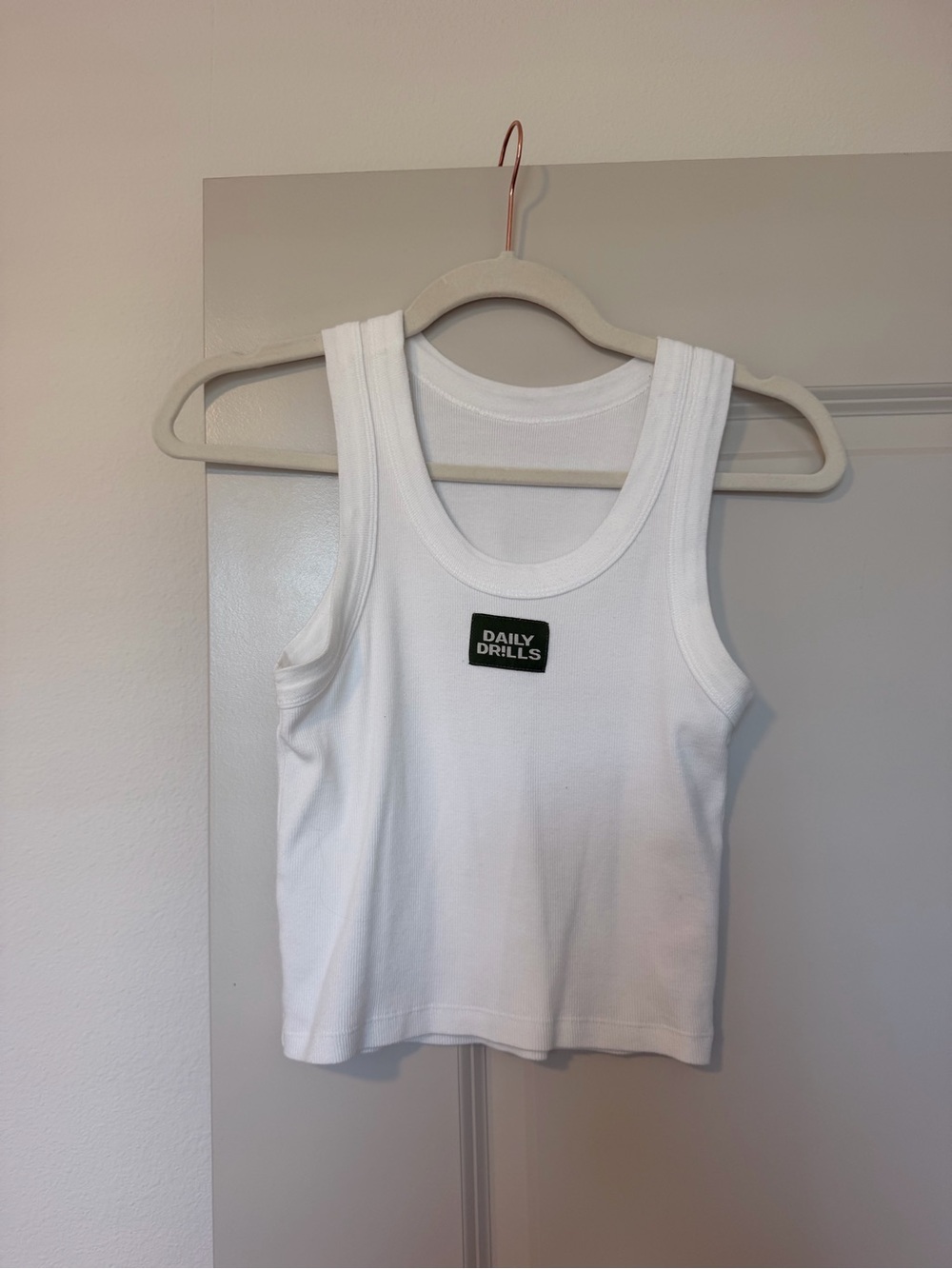 Daily Drills White Ribbed Cropped Tank with Chest Logo